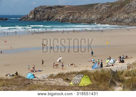 Cleden Cap Sizun, France - August 06, 2019 : People At The Beach In Baie Des Trepasses