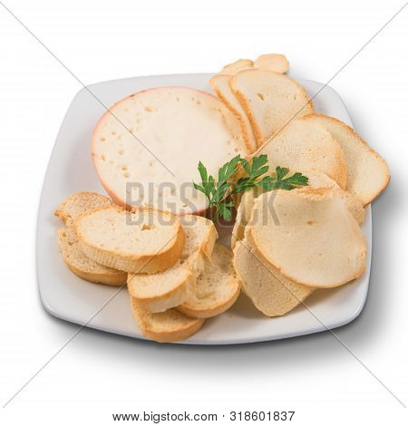 Dish With Torta Del Casar Cheese With Slices Of Toasted Bread