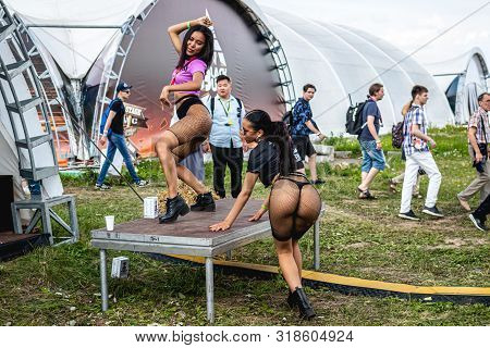 Moscow, Russia - July 27, 2019: Go Go Dance Outdoor. Young And Sexy Woman At Johncalliano Hookah Fes