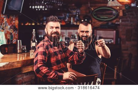 Men Relaxing At Bar. Friendship And Leisure. Friday Relaxation In Bar. Friends Relaxing In Pub. Hips