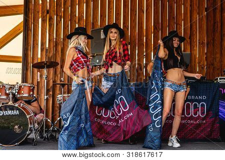 Moscow, Russia - July 27, 2019: Go Go Dance Outdoor. Young And Sexy Woman At Johncalliano Hookah Fes