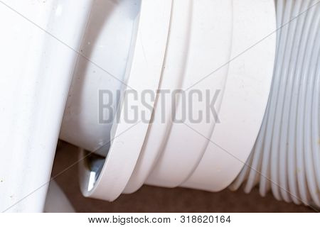 Plastic Corrugated Pan Pipe For The Toilet Drain, Plumbing Work And Installing The Toilet