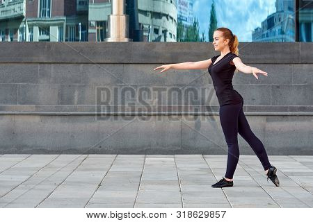 Stretching Fit Or Dancer Or Fitness Woman Doing Exercise