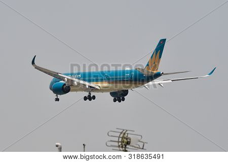 Airplane Landing At Tan Son Nhat Airport