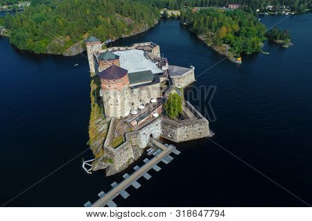 Aerial View Of The Medieval Olavinlinna Fortress On A Sunny July Day (shooting From A Quadrocopter).