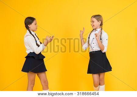 School Application Smartphone. Schoolgirls Use Mobile Phone Or Smartphone To Share Photos. Internet 