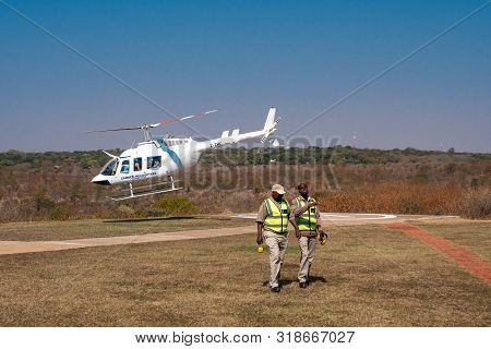 Victoria Falls, Zimbabwe - August 2 2019: Zambezi Helicopters Aircraft Starting For Victoria Falls S
