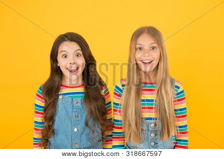 Grow Hair. Hairdresser Salon. Kids Beautiful Friends Or Sisters With Perfect Hairstyles. Chevelure C