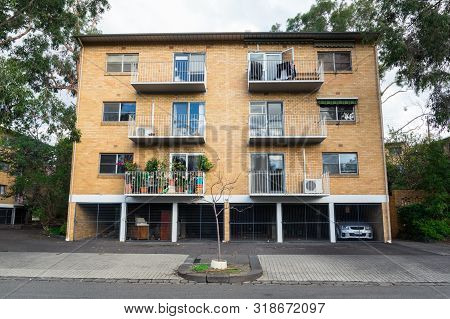 Melbourne, Australia - June 9, 2019: Brick Low-rise Apartment Building In Oshanassy Street, A Wide R