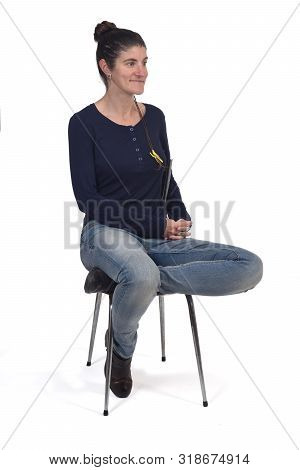 Woman Sitting In A Vintage Chair Isolated On White