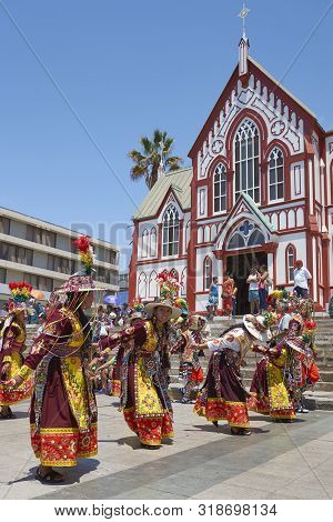 Arica, Chile - February 10, 2017: Men And Women Of The Group Thinkus Rupay Masis, Performing At The 