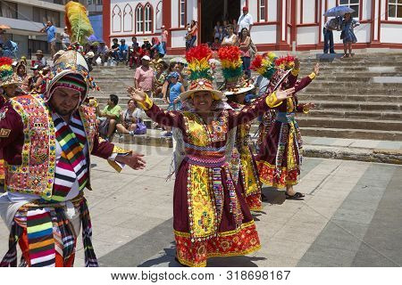 Arica, Chile - February 10, 2017: Men And Women Of The Group Thinkus Rupay Masis, Performing At The 