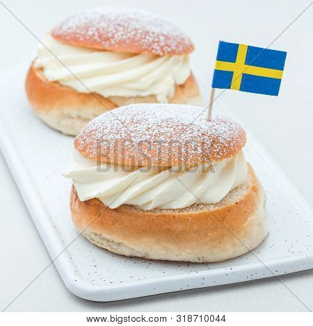 Traditional Swedish Dessert Semla, Also Called Shrove Bun, With Almond Paste And Whipped Cream Filli