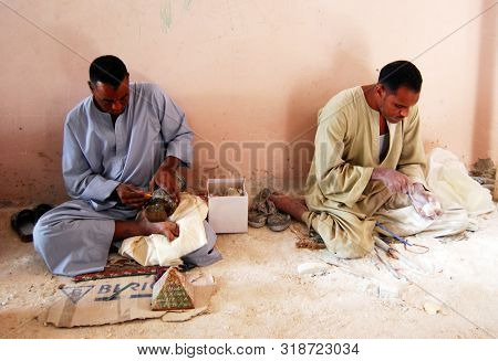 Luxor / Thebes, Egypt - May 11, 2008 - Alabaster Workers In A Workshop Working On Alabaster Items