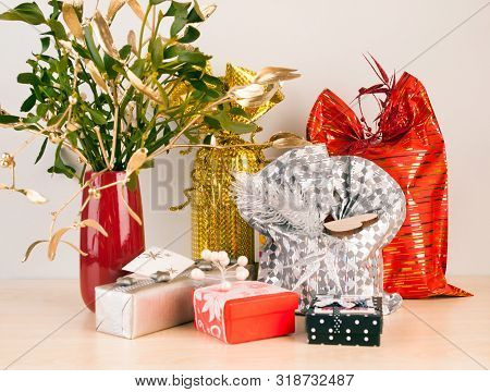 Gifts In Modern Wrappage Prepared For Christmas Eve