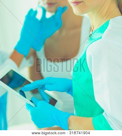 Portrait Of Female Standing Near Open Fridge Full Of Healthy Food, Vegetables And Fruits. Portrait O