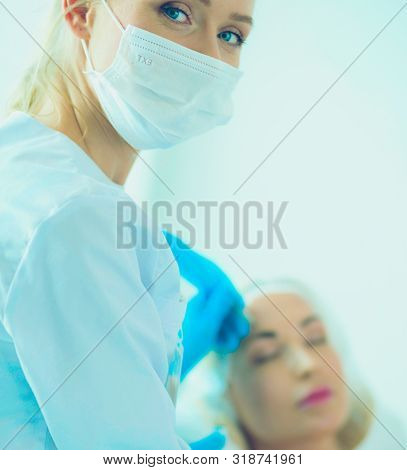 Portrait Of Female Standing Near Open Fridge Full Of Healthy Food, Vegetables And Fruits. Portrait O