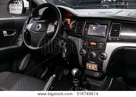 Novosibirsk, Russia - August 01, 2019:   Ssangyong
Actyon, Black Luxury Car Interior - Steering Whee