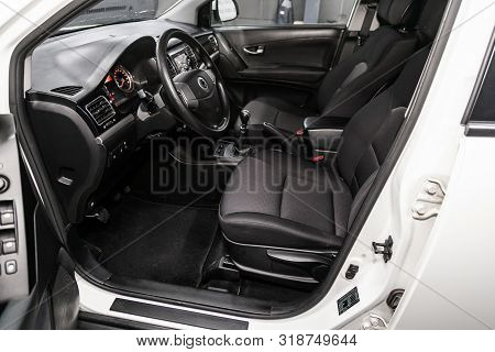 Novosibirsk, Russia - August 01, 2019:   Ssangyong
Actyon, Black Luxury Car Interior - Steering Whee