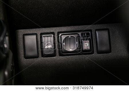 Novosibirsk, Russia - August 01, 2019:  Nissan Pathfinder, Close-up On The  Side Mirror Switch Contr