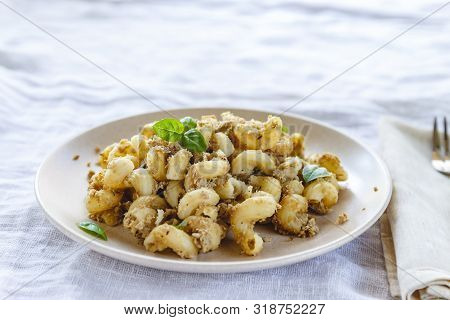 Traditional Soviet Russian Pasta Dish, Vermicelli, Navy Pasta, With Meat On A White Plate On A Light