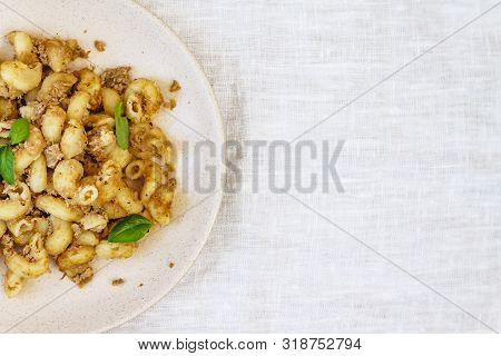 Traditional Soviet Russian Pasta Dish, Vermicelli, Navy Pasta, With Meat On A White Plate On A Light