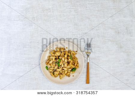 Traditional Soviet Russian Pasta Dish, Vermicelli, Navy Pasta, With Meat On A White Plate On A Light