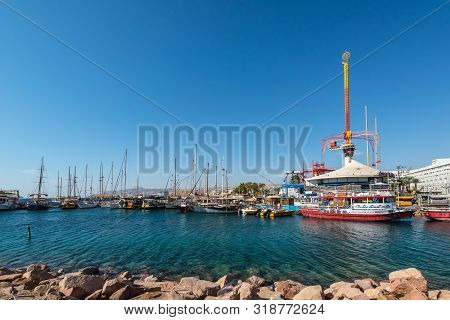 Eilat, Israel - November 7, 2017: View  Of The Pier With Boats, Yachts And Spiral Park In Eilat, Isr