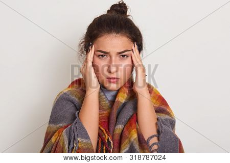 Close Up Portrait Of Beautiful Woman Touching Temples With Both Hands. Young Lady Having Headache, A