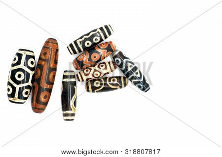 Necklace And Pendant Amulet Dzi Bead Tibet Style Isolated On White Background. Clipping Path