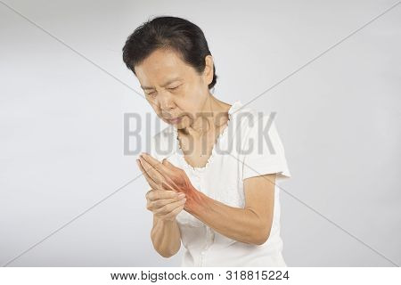 Old Asian Woman Holding Hand Muscle Pain
