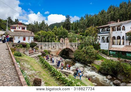 Mongui, Colombia - August, 2019: Tourists Visiting The Royal Bridge Of Calicanto At The Beautiful Sm