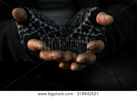 Hands Close Up Poor Old Man Or Beggar Begging You For Help Sitting At Dirty Slum. Concept For Povert