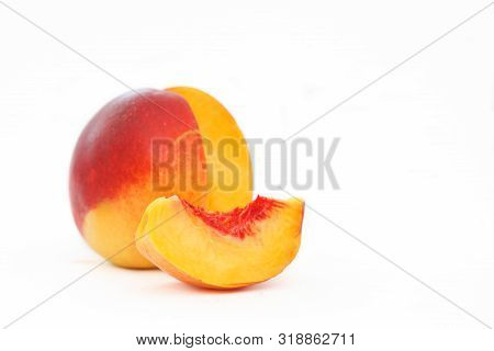 Delicious And Juicy Nectarina Peach Isolated On White Background. Healthy Summer Fruit.
