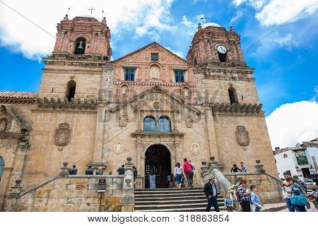 Mongui, Colombia - August, 2019: Locals And Tourists At The Historical Basilica Of Our Lady Of Mongu