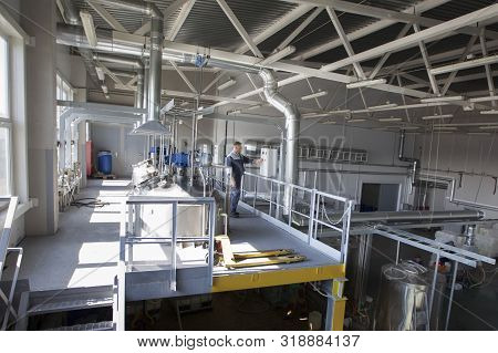 Belarus, The City Of Mensk, April 12, 2019. Chemical Production. The Worker Controls The Production.