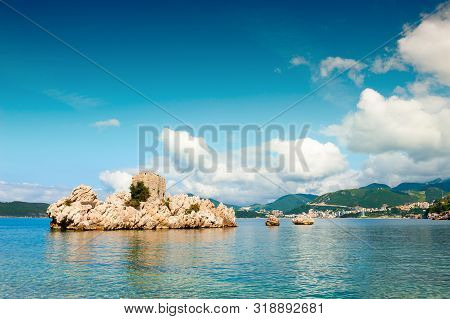 Island With Old Castle On The Beach In Przno Near Budva, Montenegro. Adriatic Sea. Famous Travel Des