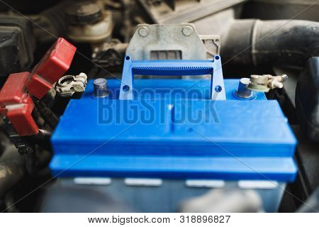 new lead-acid automotive electric battery replacement in old car