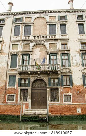Venice, Italy - May 15, 2019: View Across The Rio Del Carmini Canal Towards The Facade Of The Belgia