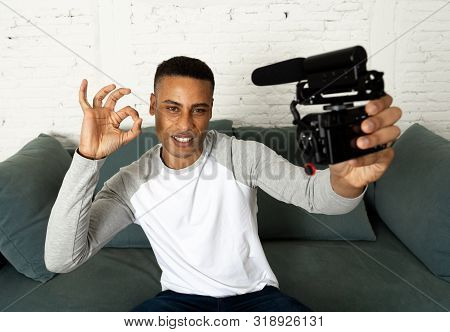 Young Happy Blogger Recording Video On Camera For Internet Blog