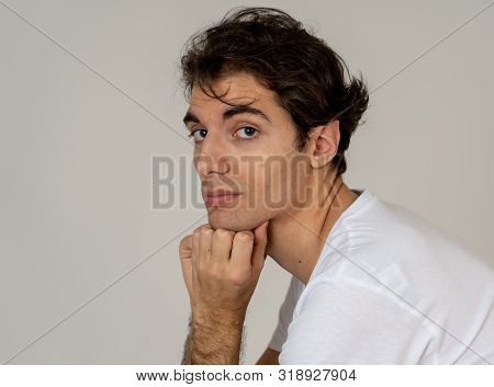Portrait Of Young Handsome Man Posing Happy For The Camera. Beauty Concept And Lifestyle
