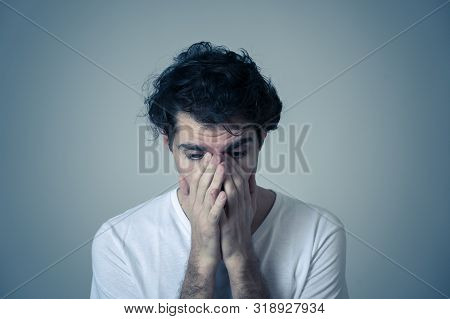 Close Up Portrait Of Young Sensitive Man Feeling In Love Looking Happy, Shy And Lucky. Isolated On N