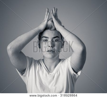 Young Sad Trans Teenager Boy Suffering From Depression Feeling Sad And Desperate. Depressed Transgen