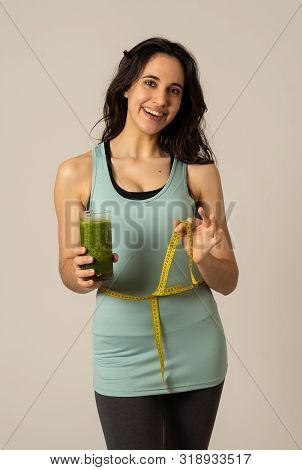 Fitness Woman Smiling Happy With Diet Plan To Loose Weight; Exercise And Green Vegetable Smoothie He