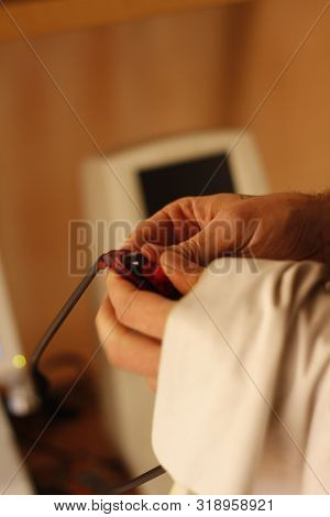 Optical Dispensing Epuipment Being Grinding Prescription Lenses In Australia