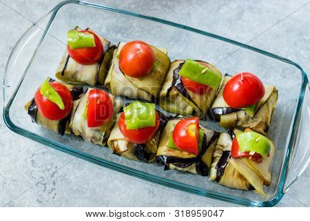 Turkish Islim Kofta Kebab With Meatballs And Cherry Tomatoes Wrapped In Eggplant / Aubergine Slices.