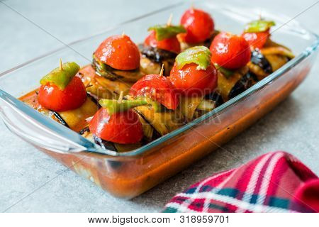Turkish Islim Kofta Kebab With Meatballs And Cherry Tomatoes Wrapped In Eggplant / Aubergine Slices.