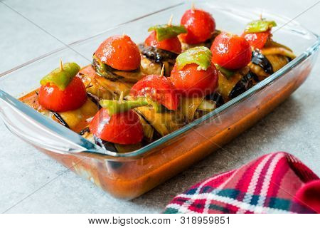 Turkish Islim Kofta Kebab With Meatballs And Cherry Tomatoes Wrapped In Eggplant / Aubergine Slices.