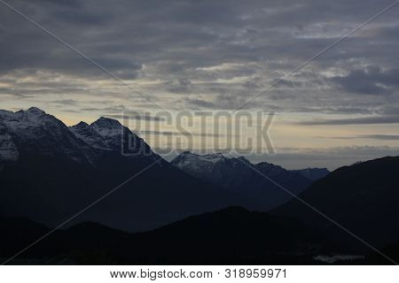 Snowcapped Mountains Seen From A Mountain Road In Switzerland, Europe