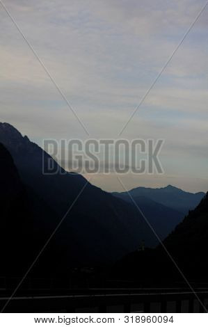 Snowcapped Mountains Seen From A Mountain Road In Switzerland, Europe